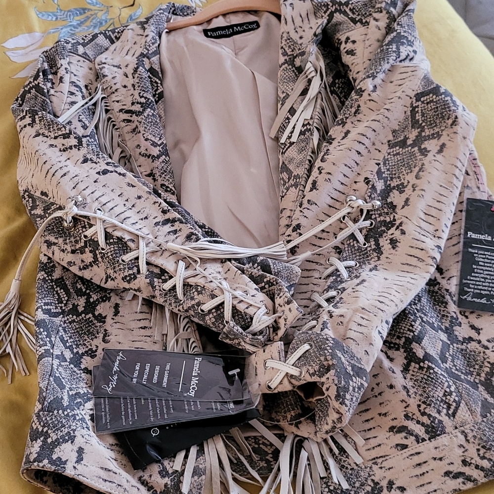 Really cool brand new never worn faux snake skin.